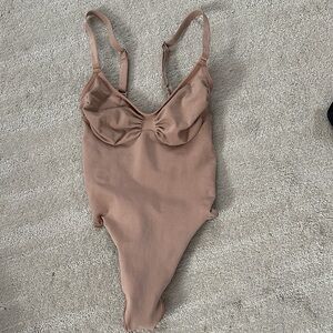 skims thong bodysuit runs super small